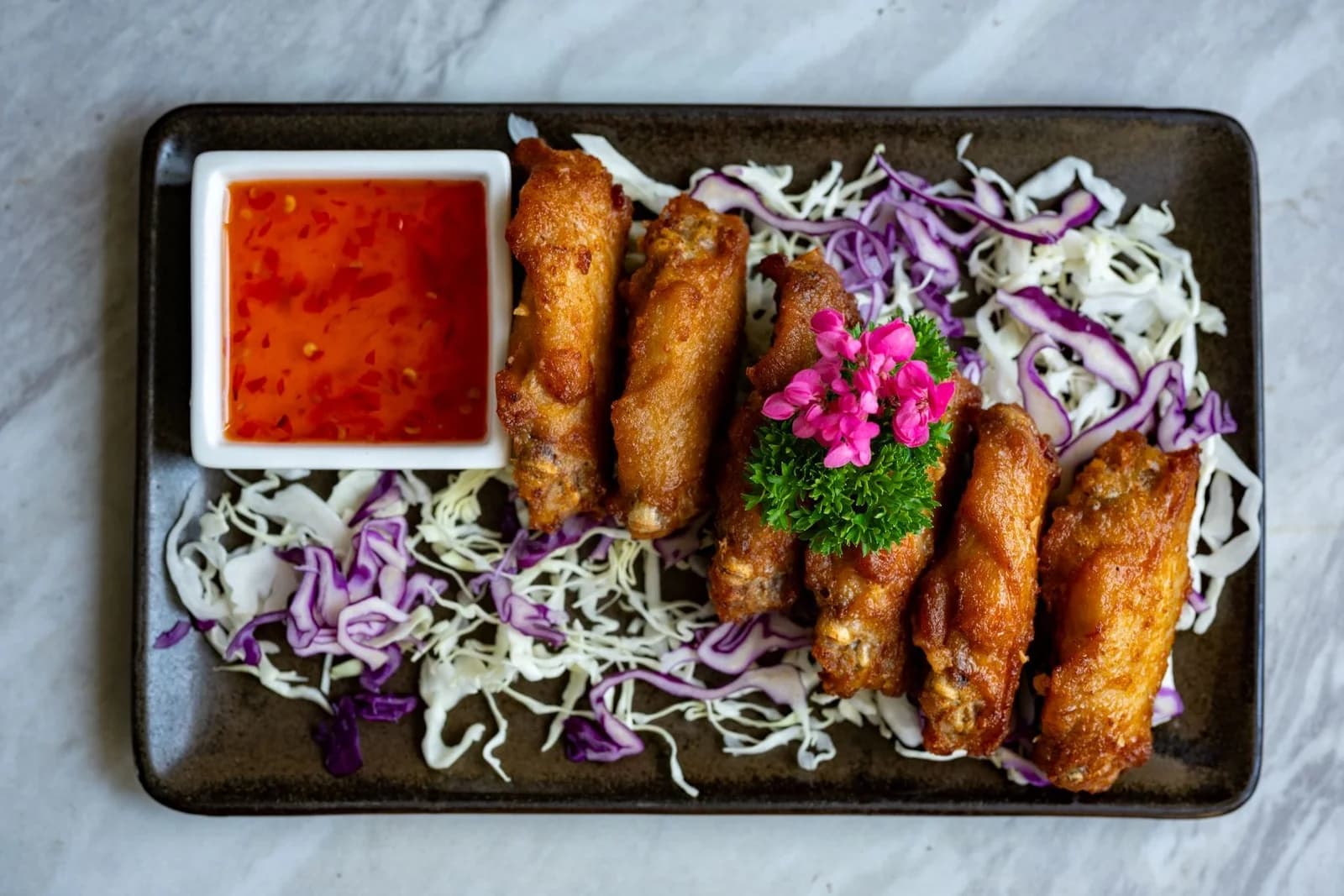 A plate of chicken wings at SOHO Pool Club, Boat Lagoon Marina Phuket