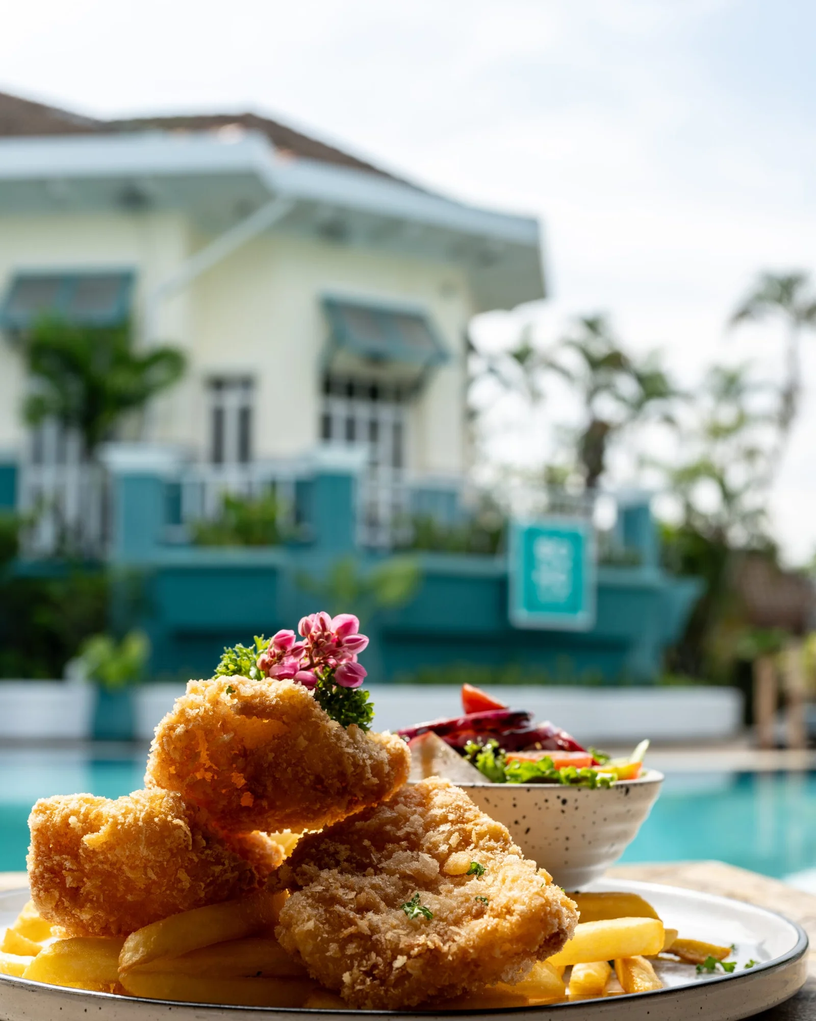 Beer-battered fish and chips at SOHO Pool Club, Boat Lagoon Marina