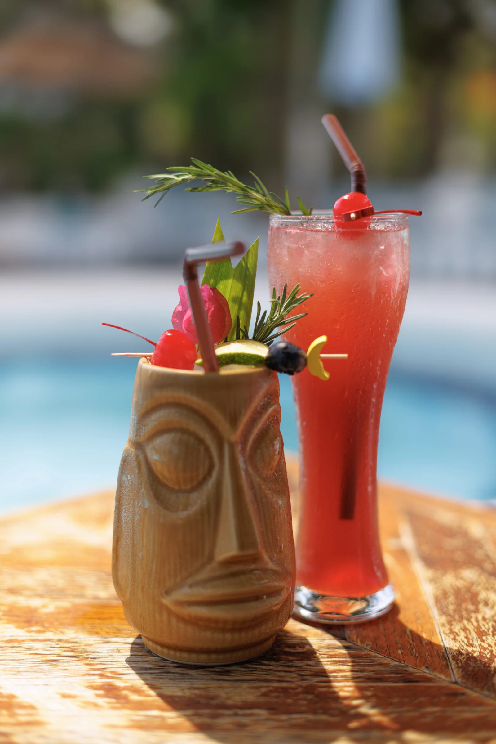 Signature Piña Colada and Singapore Sling cocktails at Soho Pool Club Phuket
