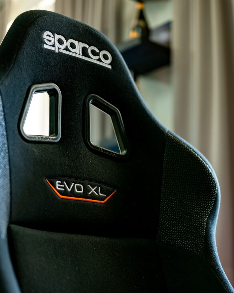 Close-up of Sparco EVO XL racing seat used in professional simulators at SimPro Academy Phuket